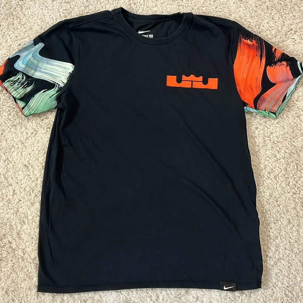 NIKE M LeBron James black shirt  with orange emblem and with bright sleeves